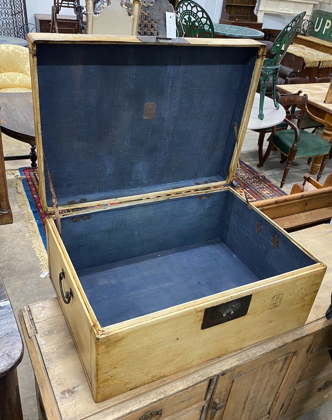 A Chinese vellum covered trunk, with brass loop handles, width 76cm